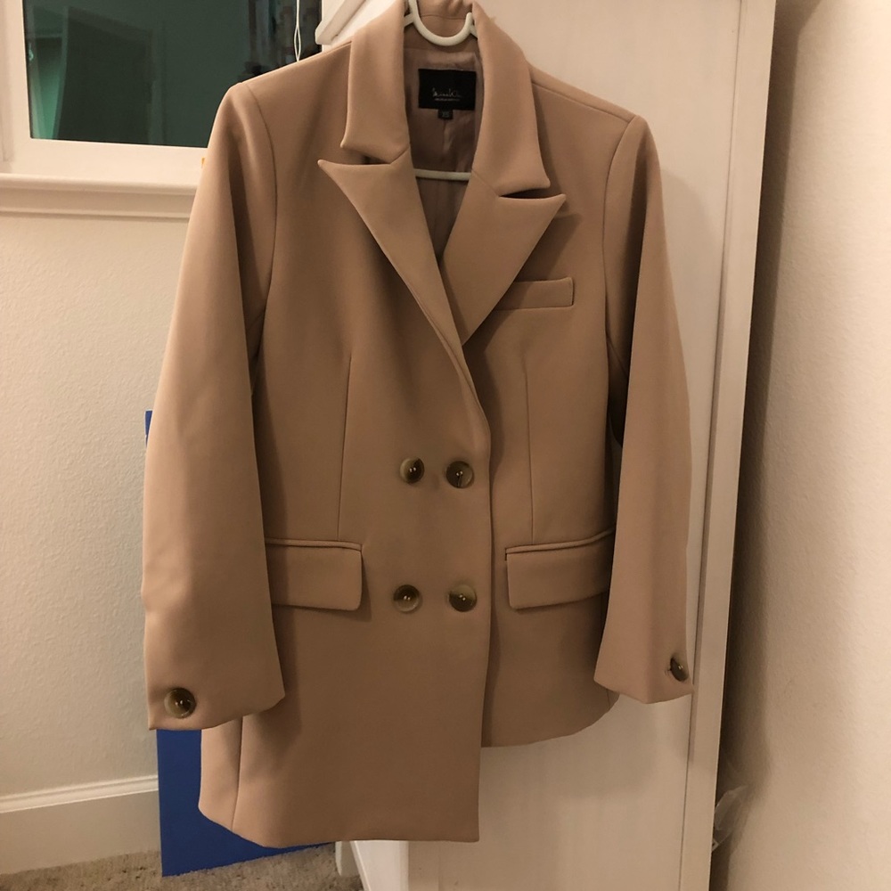 Asymmetrical designed blazer brand new